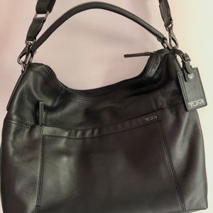 Tumi black leather bag